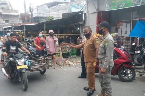 Petugas Satgas Covid-19 Patroli Prokes dan Pengawasan PPKM Mikro di Kecamatan Medan Timur
